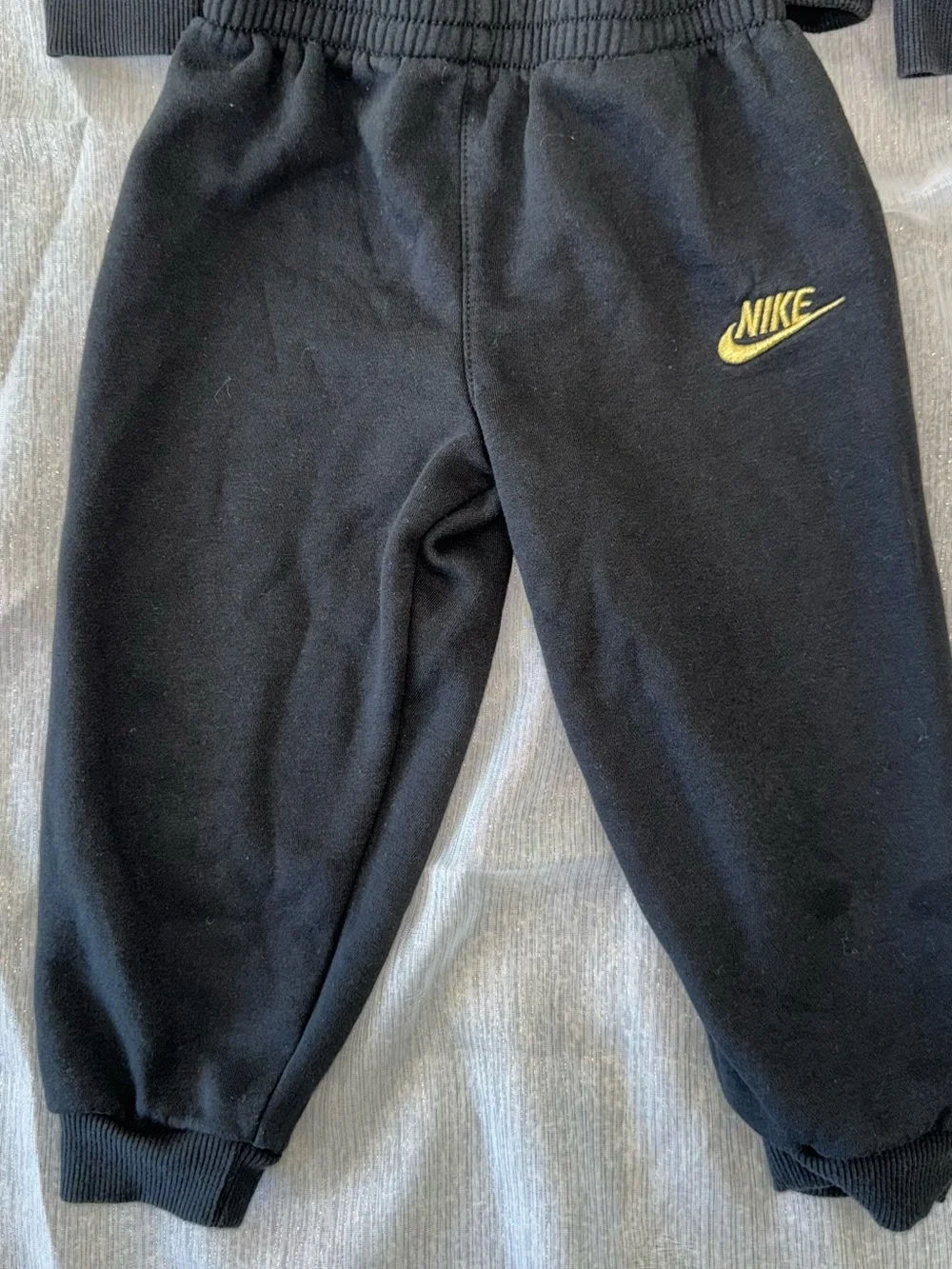 Nike Black Jogger Pants with Gold Swoosh